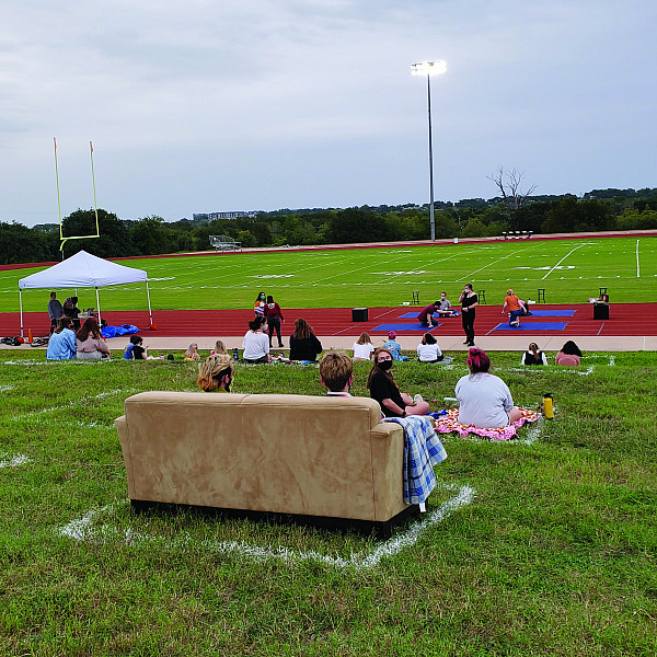A socially distanced outdoor theatre performance.