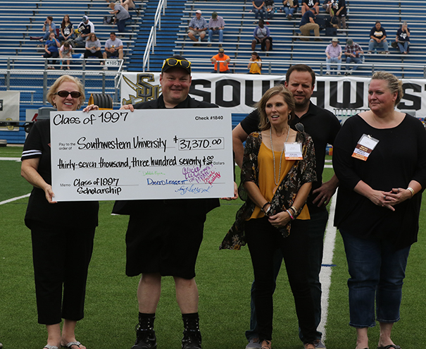 Class of 1997 Presents Scholarship Check